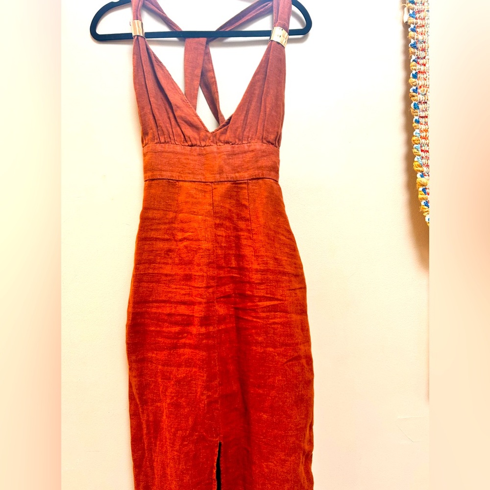 Brown wash 
Light material 
Beautiful gold cuffs on straps
Sexy slit in front